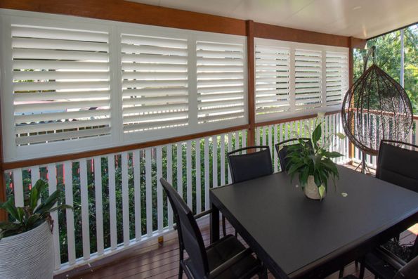 Outdoor deck area with plantation shutters | Featured image for the Shutters Brisbane Top Level Page on Shutters Blinds & Awnings